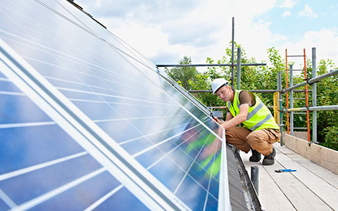 energy professional installing solar installations