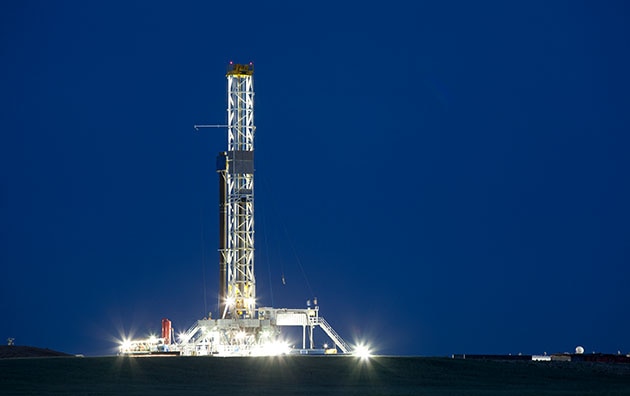 Oil and gas rig at night
